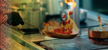 chef cooking with open flame